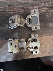 Slow close box of 25 Count of 1 1/12 overlay cabinet hinges with screws