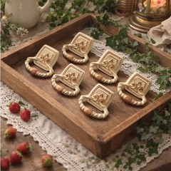 Vintage Amerock Bonaventure fixed ring pulls in a Regency White and Gold finish