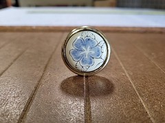 Belwith Hickory English Cozy Blue Flower Almond Ceramic 1 1/4″ knob P426-BF