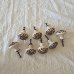 Lot of 8 Vintage ceramic cream with brown/bronze lace metal overlay knobs