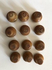 Lot Of 12 Wooden Knobs Rustic light varnish and dust on them no screws included