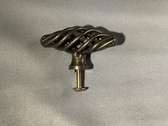 Cabinet/drawer knobs oval metal “bird cage” 2″ long 27 total knobs all the same.