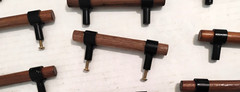 A Lot Walnut Wood and Black Forge Hardware Drawer Pulls