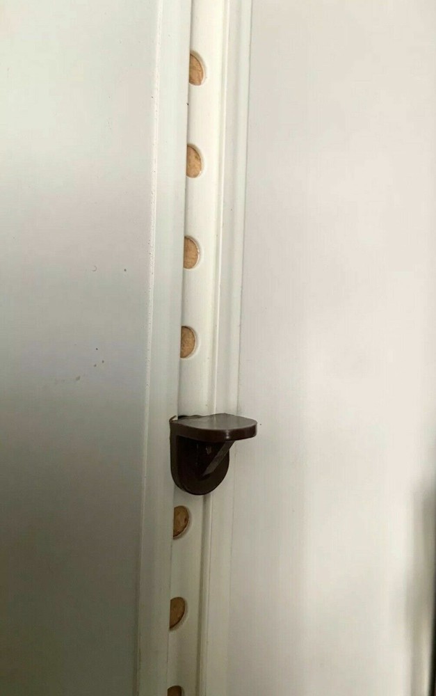 Twist-In Cabinet Shelf Pins. Sorice CD Cabinet, Enterprise Cabinet Systems