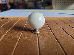 Belwith Hickory P21-LAD 1 1/4″ light Almond Cabinet Knob Pull with Antique Brass